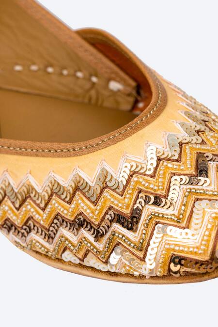 Shop_NR By Nidhi Rathi_Gold Chevron Hand Embroidered Juttis_Online_at_Aza_Fashions