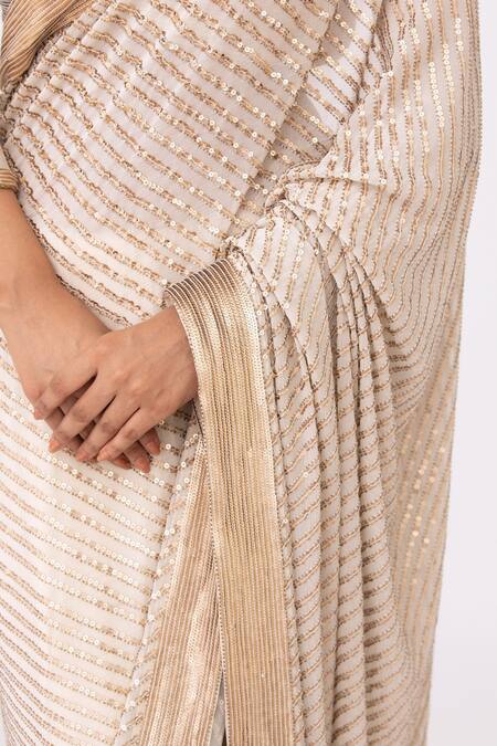 Shop Nakul Sen White Chiffon Sequin Boat Striped Saree Set Online at Aza Fashions Shop_Nakul Sen_White Chiffon Sequin Boat Striped Saree Set _Online_at_Aza_Fashions