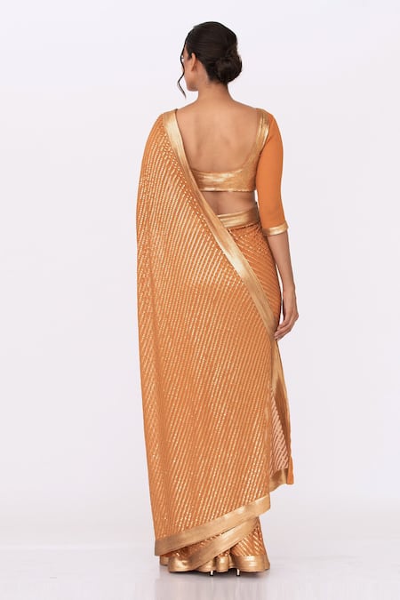 Shop Nakul Sen Orange Chiffon Sequin Boat Striped Saree Set at Aza Fashions Shop_Nakul Sen_Orange Chiffon Sequin Boat Striped Saree Set _at_Aza_Fashions