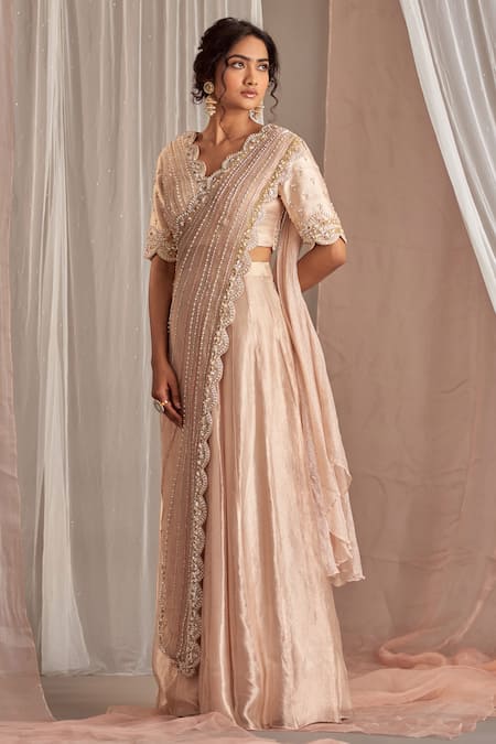 Buy_NIDHIKA SHEKHAR_Beige Silk, Organza, Satin, Crinkle Tissue Cutdana Draped Blouse And Lehenga Set _Online_at_Aza_Fashions