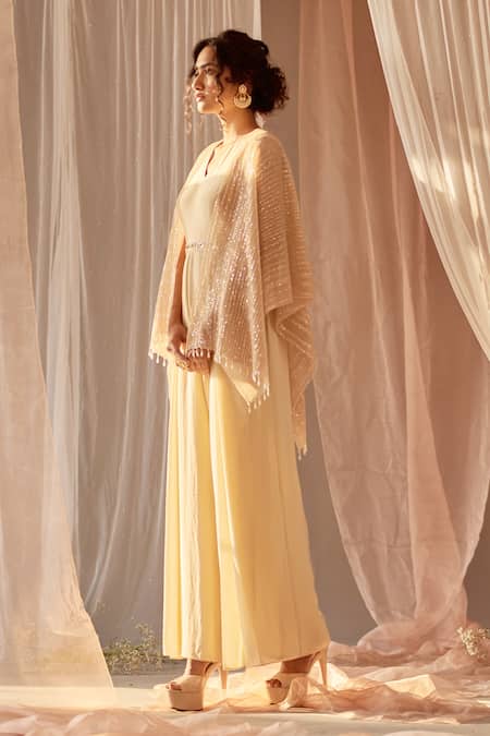 NIDHIKA SHEKHAR_Beige Crepe Cutdana Work, Pearl Work, Sequins, Sitaare Jumpsuit Cape Set _Online_at_Aza_Fashions