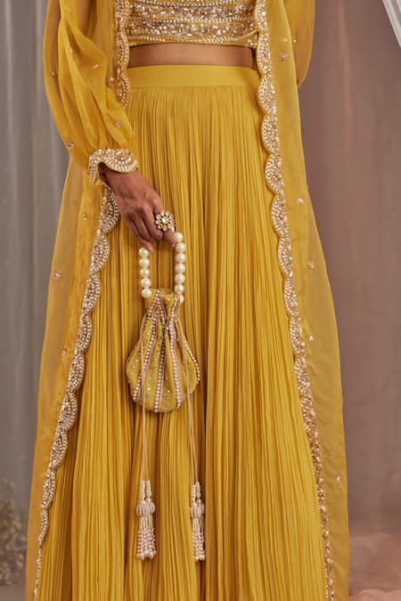 Nidhika Shekhar_Yellow Silk, Organza, Georgette Cutdana Bead Embroidered Jacket Lehenga Set _at_Aza_Fashions