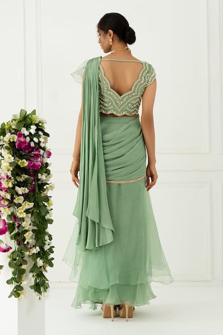 Shop_Nidhika Shekhar_Green Silk, Organza, Crepe Scoop Neck Ruffle Pre-draped Saree With Blouse _at_Aza_Fashions