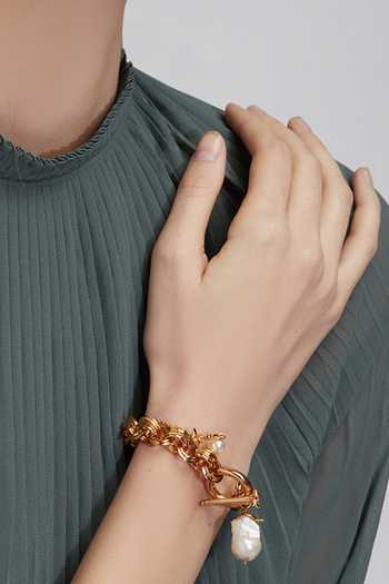Buy Outhouse Gold Plated Pearls Toggle Clasp Bracelet at Aza Fashions Buy_Outhouse_Gold Plated Pearls Toggle Clasp Bracelet _at_Aza_Fashions