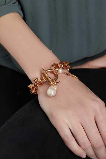 Buy Outhouse Gold Plated Pearls Toggle Clasp Bracelet Online at Aza Fashions Buy_Outhouse_Gold Plated Pearls Toggle Clasp Bracelet _Online_at_Aza_Fashions