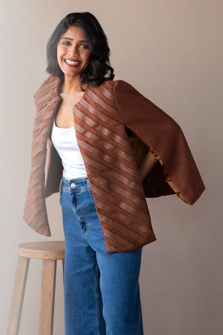 Shop Rhe-Ana Brown Lining 100% Poly, Poly/pu Chevron Round Embellished Cape at Aza Fashions Shop_Rhe-Ana_Brown Lining 100% Poly, Poly/pu Chevron Round Embellished Cape _at_Aza_Fashions