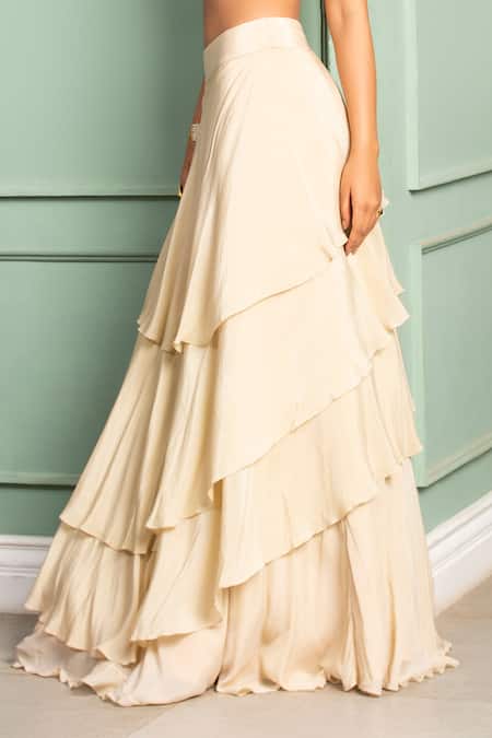 Shop Izzumi Mehta Beige Organza, Korean Crepe V Neck Embroidered Blouse And Layered Lehenga Set at Aza Fashions Shop_Izzumi Mehta_Beige Organza, Korean Crepe V Neck Embroidered Blouse And Layered Lehenga Set _at_Aza_Fashions