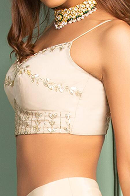 Izzumi Mehta Beige Organza, Korean Crepe V Neck Embroidered Blouse And Layered Lehenga Set Online at Aza Fashions Izzumi Mehta_Beige Organza, Korean Crepe V Neck Embroidered Blouse And Layered Lehenga Set _Online_at_Aza_Fashions