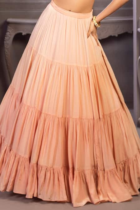 Shop Izzumi Mehta Peach Korean Crepe V Neck Embroidered Blouse And Tiered Lehenga Set at Aza Fashions Shop_Izzumi Mehta_Peach Korean Crepe V Neck Embroidered Blouse And Tiered Lehenga Set _at_Aza_Fashions
