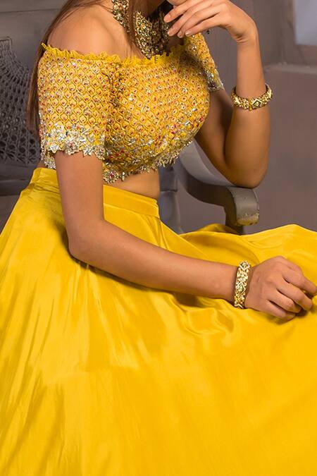 Izzumi Mehta Yellow Net, Korean Crepe One Shoulder Embroidered Off Blouse And Lehenga Set Online at Aza Fashions Izzumi Mehta_Yellow Net, Korean Crepe One Shoulder Embroidered Off Blouse And Lehenga Set _Online_at_Aza_Fashions