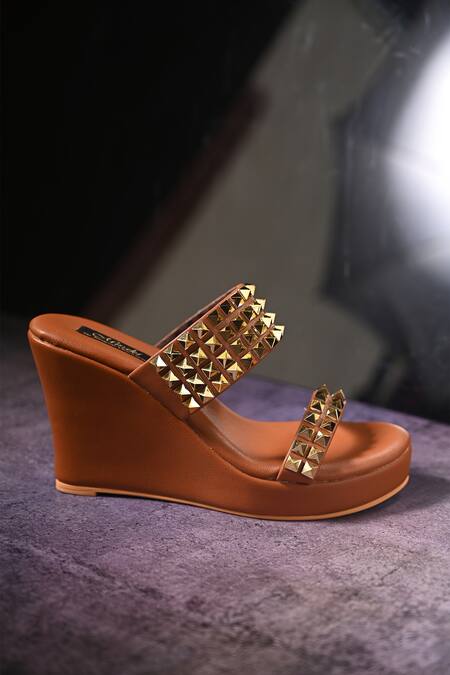 Miraki Brown Studs Embellished Wedges at Aza Fashions Miraki_Brown Studs Embellished Wedges _at_Aza_Fashions