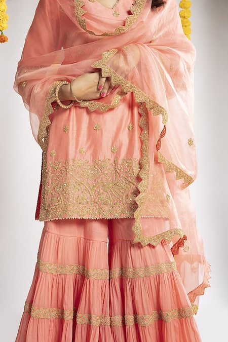 Buy Priyaa Peach Organza, Chanderi Silk Gota And Mirror V Neck Kurta Sharara Set Online at Aza Fashions Buy_Priyaa_Peach Organza, Chanderi Silk Gota And Mirror V Neck Kurta Sharara Set _Online_at_Aza_Fashions