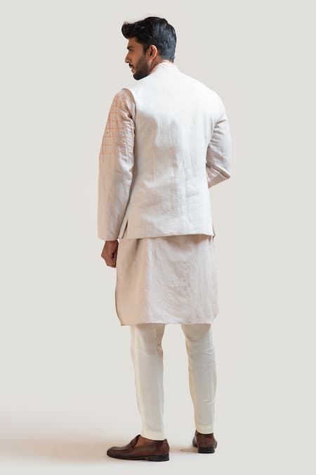 Asymmetrical kurta with hand embroidered nehru jacket paired with white  trousers. | Indian wedding clothes for men, Wedding outfit men, Indian men  fashion