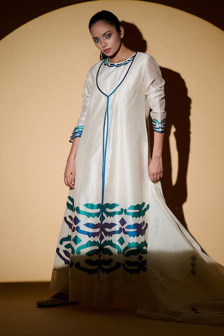 Taika By Poonam Bhagat White Chanderi, Lycra Net Floral Motifs Round Applique Jacket Anarkali Set 