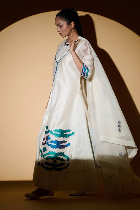 Taika By Poonam Bhagat White Chanderi, Lycra Net Floral Motifs Round Applique Jacket Anarkali Set Online at Aza Fashions Taika By Poonam Bhagat_White Chanderi, Lycra Net Floral Motifs Round Applique Jacket Anarkali Set _Online_at_Aza_Fashions