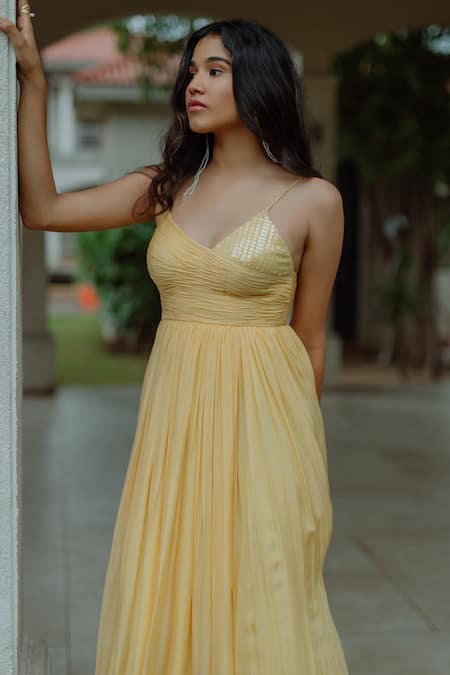 Shop Pinup By Astha Yellow Flat Chiffon Plunge V Neck Peitho Ruched Gown Online at Aza Fashions Shop_Pinup By Astha_Yellow Flat Chiffon Plunge V Neck Peitho Ruched Gown _Online_at_Aza_Fashions
