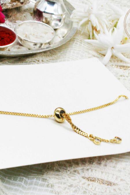 Puneet Gupta_Gold Stones Natural Rakhi_Online_at_Aza_Fashions