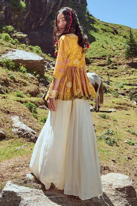 Shop Paulmi And Harsh Yellow Peplum Malai Chanderi And Palazzo Cotton Silk Mirror & Resham, Top & Set at Aza Fashions Shop_Paulmi And Harsh_Yellow Peplum Malai Chanderi And Palazzo Cotton Silk Mirror & Resham, Top & Set _at_Aza_Fashions