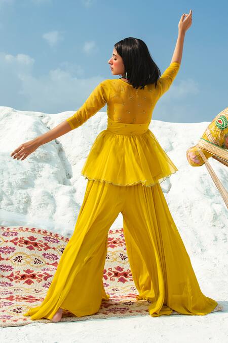 Shop Paulmi And Harsh Yellow Embroidered Top With Flared Pant at Aza Fashions Shop_Paulmi And Harsh_Yellow Embroidered Top With Flared Pant_at_Aza_Fashions