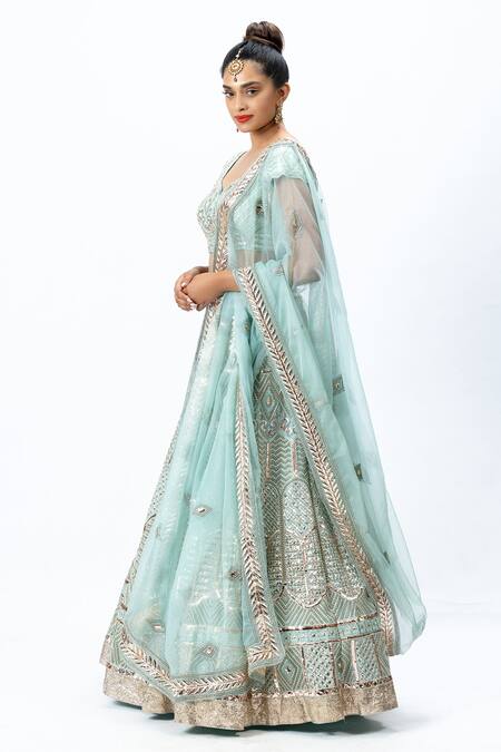 Nirmooha Blue Organza Leaf Neck Hand Embroidered Bridal Lehenga Set Online at Aza Fashions Nirmooha_Blue Organza Leaf Neck Hand Embroidered Bridal Lehenga Set _Online_at_Aza_Fashions