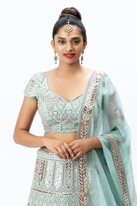 Buy Nirmooha Blue Organza Leaf Neck Hand Embroidered Bridal Lehenga Set Online at Aza Fashions Buy_Nirmooha_Blue Organza Leaf Neck Hand Embroidered Bridal Lehenga Set _Online_at_Aza_Fashions