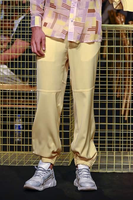 Shop_Nirmooha_Yellow Micro Plain Joggers _Online_at_Aza_Fashions