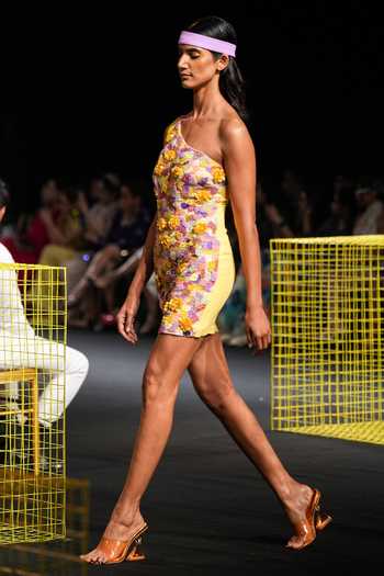 Nirmooha Yellow Lurex Floral, Tassel Asymmetric Embroidered One Shoulder Dress at Aza Fashions Nirmooha_Yellow Lurex Floral, Tassel Asymmetric Embroidered One Shoulder Dress_at_Aza_Fashions