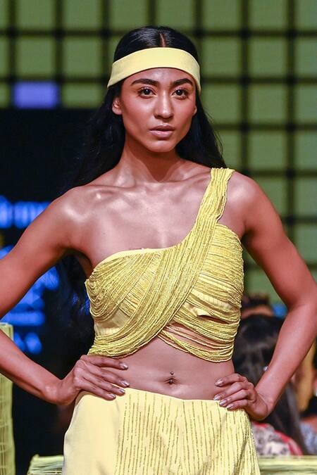 Shop Nirmooha Yellow Lurex Tassel Asymmetric Embroidered Crop Top Online at Aza Fashions Shop_Nirmooha_Yellow Lurex Tassel Asymmetric Embroidered Crop Top_Online_at_Aza_Fashions