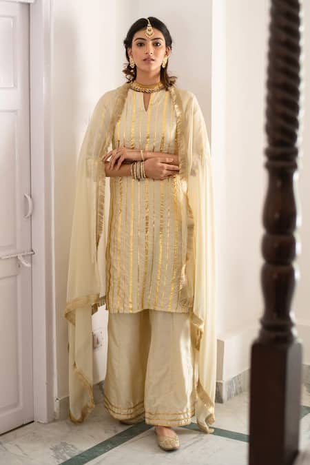 Shop Palak & Mehak Beige Dupatta Chiffon, Kurta And Pant Cotton Silk Gota Embroidered Palazzo Set at Aza Fashions Shop_Palak & Mehak_Beige Dupatta Chiffon, Kurta And Pant Cotton Silk Gota Embroidered Palazzo Set _at_Aza_Fashions