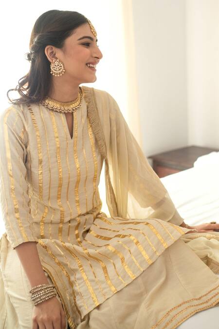 Shop Palak & Mehak Beige Dupatta Chiffon, Kurta And Pant Cotton Silk Gota Embroidered Palazzo Set Online at Aza Fashions Shop_Palak & Mehak_Beige Dupatta Chiffon, Kurta And Pant Cotton Silk Gota Embroidered Palazzo Set _Online_at_Aza_Fashions