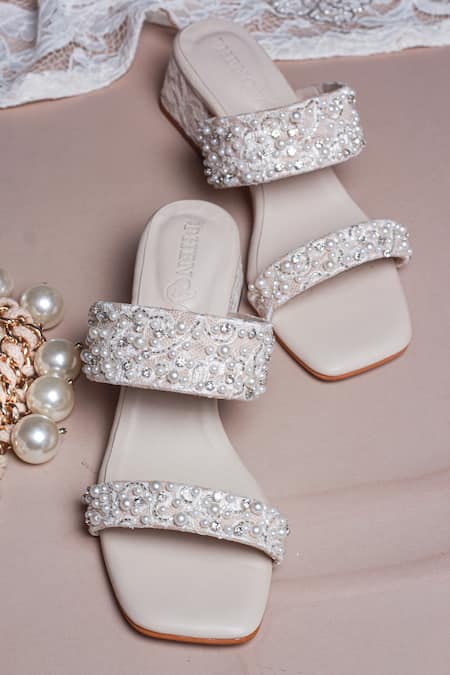 Shop PHENOMINAAL Off White Embellishments Strap Block Heels at Aza Fashions Shop_PHENOMINAAL_Off White Embellishments Strap Block Heels _at_Aza_Fashions