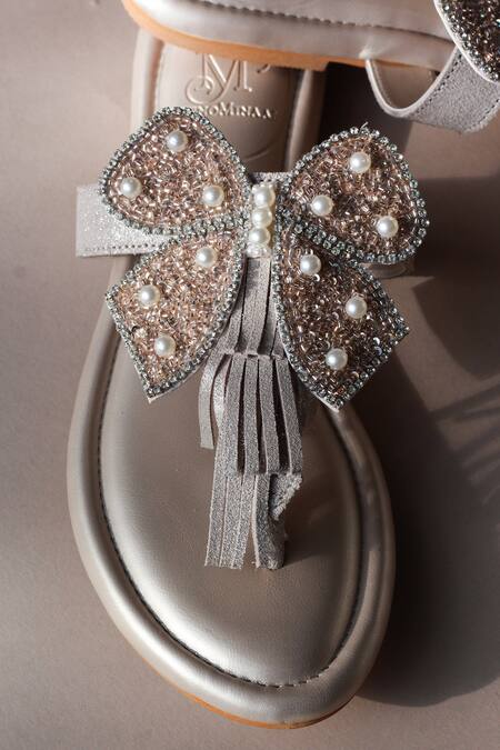 PHENOMINAAL_Beige Hand Embroidered Bow Flat Sandals _at_Aza_Fashions