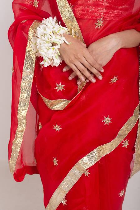 Project And Stories_Red Organza Embroidered Butti Zardozi Saree_at_Aza_Fashions