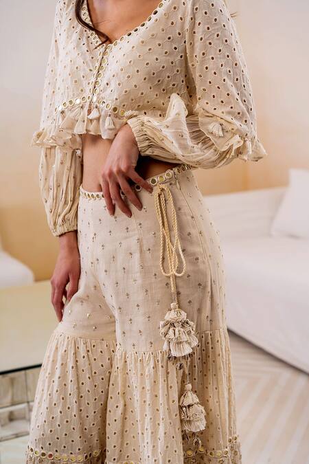 Shop Surily G Ivory Cotton Cutwork, Mirror V Neck Crop Top at Aza Fashions Shop_Surily G_Ivory Cotton Cutwork, Mirror V Neck Crop Top_at_Aza_Fashions