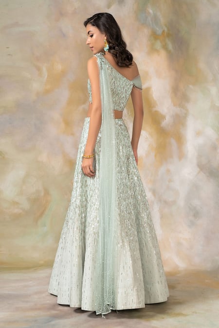 Shop Pooja Peshoria Green Silk Asymmetric Embroidered One Shoulder Lehenga Set at Aza Fashions Shop_Pooja Peshoria_Green Silk Asymmetric Embroidered One Shoulder Lehenga Set _at_Aza_Fashions