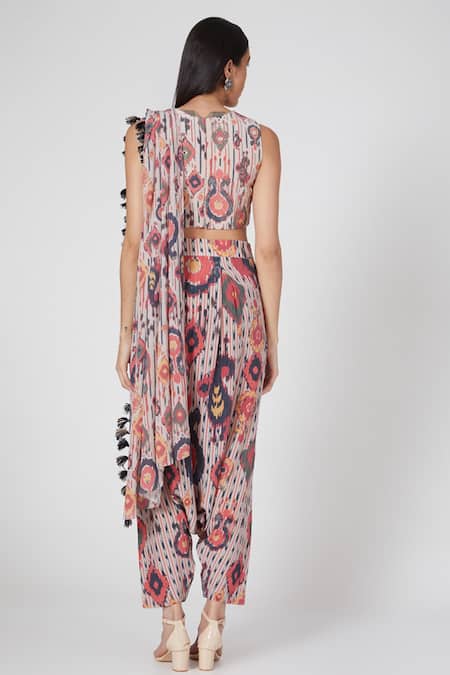 Shop Payal Singhal Red Crepe, Art Georgette Ikat Tribe Patterns Round Dhoti Saree With Print Top at Aza Fashions Shop_Payal Singhal_Red Crepe, Art Georgette Ikat Tribe Patterns Round Dhoti Saree With Print Top _at_Aza_Fashions