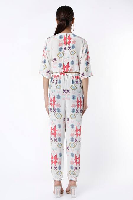 Shop PS Pret By Payal Singhal White Crepe Ikat Star Round Crop Top And Jogger Pant Set at Aza Fashions Shop_PS Pret By Payal Singhal_White Crepe Ikat Star Round Crop Top And Jogger Pant Set_at_Aza_Fashions