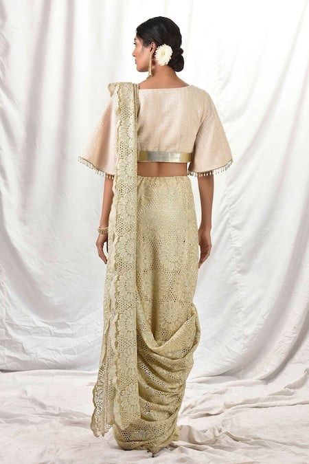 Shop Priyal Bhardwaj Gold Net Zari V Neck Floral Embroidered Saree With Blouse at Aza Fashions Shop_Priyal Bhardwaj_Gold Net Zari V Neck Floral Embroidered Saree With Blouse _at_Aza_Fashions