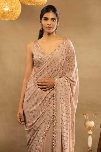 Isha & Shreya_Peach Crepe Embroidery Laser Cut V Neck Zahra Embellished Saree With Blouse_Online_at_Aza_Fashions