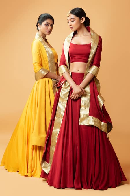Buy_Quench A Thirst_Yellow Modal Silk Plain Scoop Neck Lehenga Set With Border Embroidered Dupatta _Online_at_Aza_Fashions