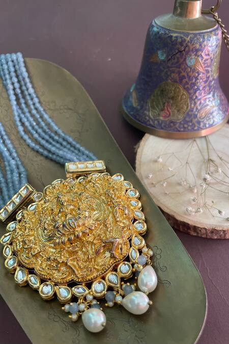 Buy Nayaab By Sonia Gold Plated Carved Temple Pendant Necklace Online at Aza Fashions Buy_Nayaab By Sonia_Gold Plated Carved Temple Pendant Necklace _Online_at_Aza_Fashions