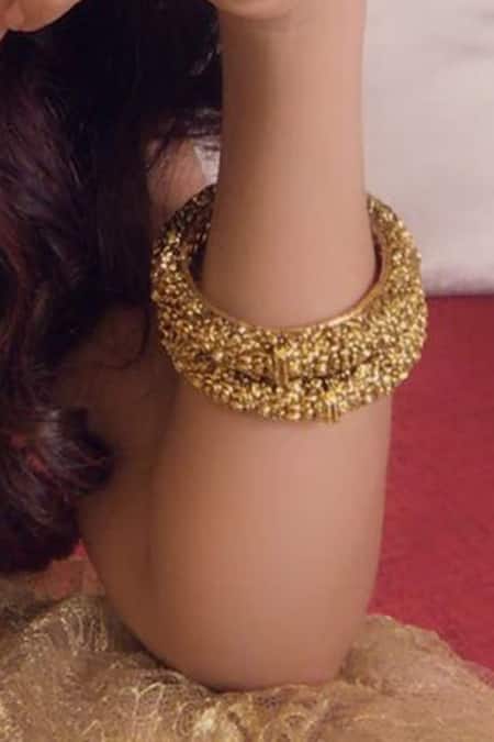 Buy_Riana Jewellery_Gold Plated Cut Work Carved Bangle - Set Of 2 _Online_at_Aza_Fashions