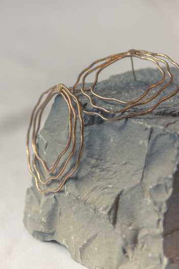 Buy_Nirjara_Gold Plated Floral Motif Wired Hoop Earrings _Online_at_Aza_Fashions