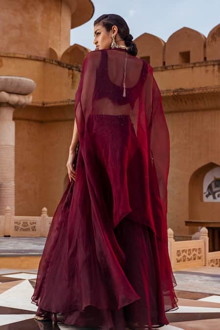 Shop Ridhima Bhasin Maroon Organza And Georgette Sequin & Cape & Waistband Embroidered Lehenga Set at Aza Fashions Shop_Ridhima Bhasin_Maroon Organza And Georgette Sequin & Cape & Waistband Embroidered Lehenga Set _at_Aza_Fashions