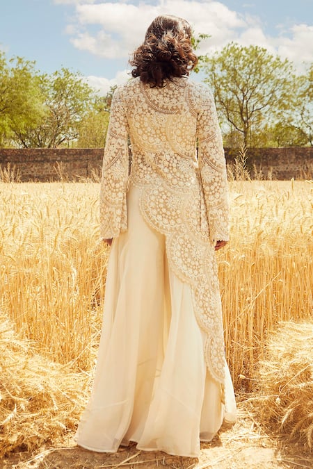 Shop Ridhima Bhasin White Organza, Tulle Round Asymmetric Kurta And Pant Set at Aza Fashions Shop_Ridhima Bhasin_White Organza, Tulle Round Asymmetric Kurta And Pant Set _at_Aza_Fashions