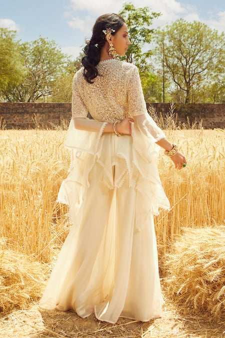Shop Ridhima Bhasin White Organza, Tulle Round Asymmetric Tunic And Sharara Pant Set at Aza Fashions Shop_Ridhima Bhasin_White Organza, Tulle Round Asymmetric Tunic And Sharara Pant Set _at_Aza_Fashions
