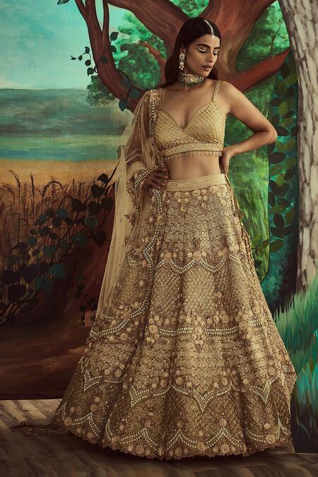 Shop Angad Singh Gold Dupatta Net, Lehenga And Blouse Organza Embroidered Trail Bridal Set Online at Aza Fashions Shop_Angad Singh_Gold Dupatta Net, Lehenga And Blouse Organza Embroidered Trail Bridal Set _Online_at_Aza_Fashions