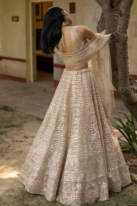 Shop Angad Singh Gold Net Lining Satin V Neck Embroidered Bridal Lehenga Set at Aza Fashions Shop_Angad Singh_Gold Net Lining Satin V Neck Embroidered Bridal Lehenga Set _at_Aza_Fashions
