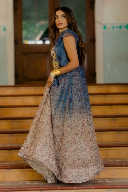 Shop Nikita Vishakha White Net, Georgette Persian Carpet Pattern, Zari Dori And Printed Lehenga Set at Aza Fashions Shop_Nikita Vishakha_White Net, Georgette Persian Carpet Pattern, Zari Dori And Printed Lehenga Set _at_Aza_Fashions