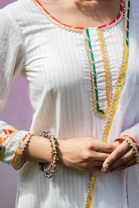 Shop Rivaaj Clothing White Stripe Pattern Kurta Gharara Set Online at Aza Fashions Shop_Rivaaj Clothing_White Stripe Pattern Kurta Gharara Set _Online_at_Aza_Fashions